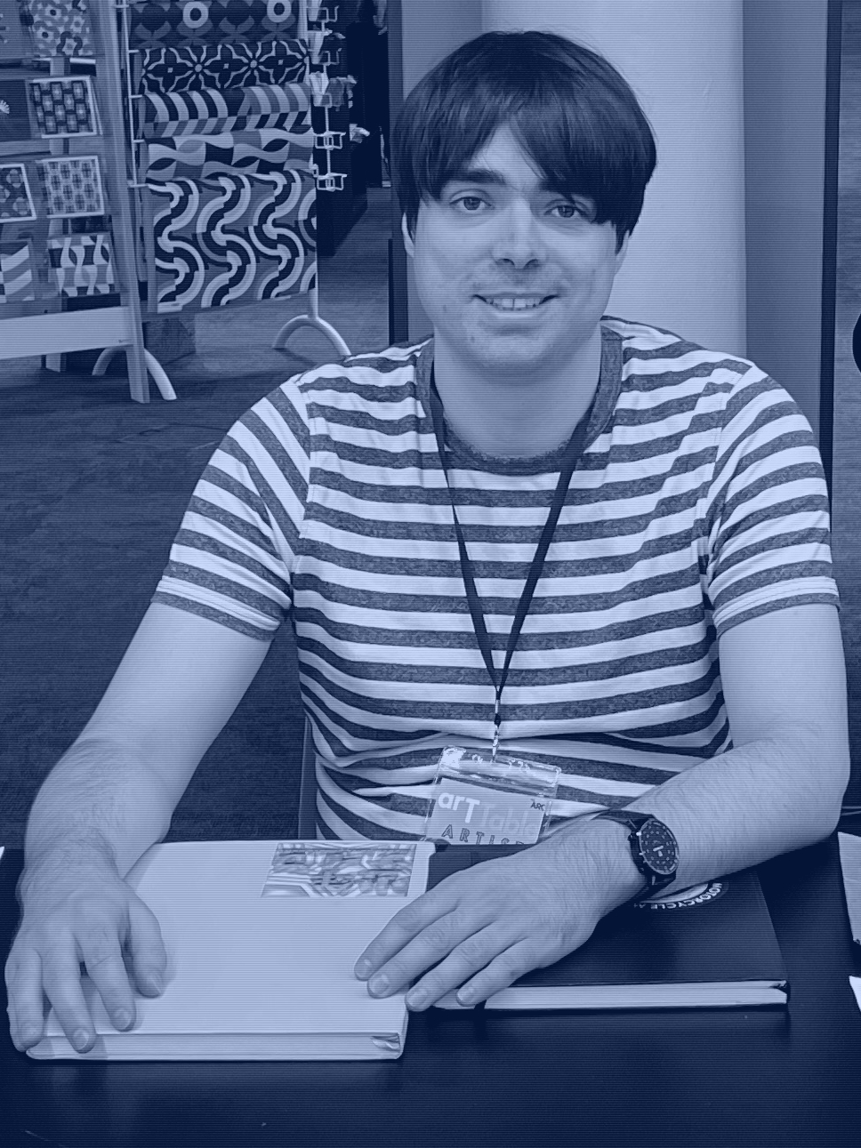 Photo of the artist with a halftone and blue filter on